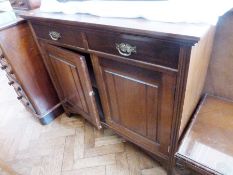 A early 20th century mahogany sideboard, with pair of doors and cupboards on bracket style feet with