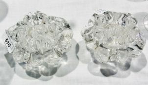 A pair of clear glass candlesticks, possibly Offerrors, moulded flower-shaped, 12cm in diameter
