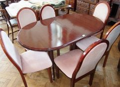 A modern mahogany extending dining table, 150cm (unextended) with six matching chairs, with pale