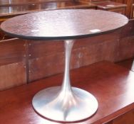A mid 20th century oval occasional table, with rosewood veneer top, to metal circular base