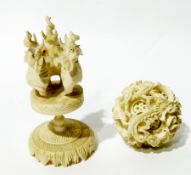 Japanese ivory puzzle ball, dragon decorated on stand of three elephants, circular plinth base, 14cm