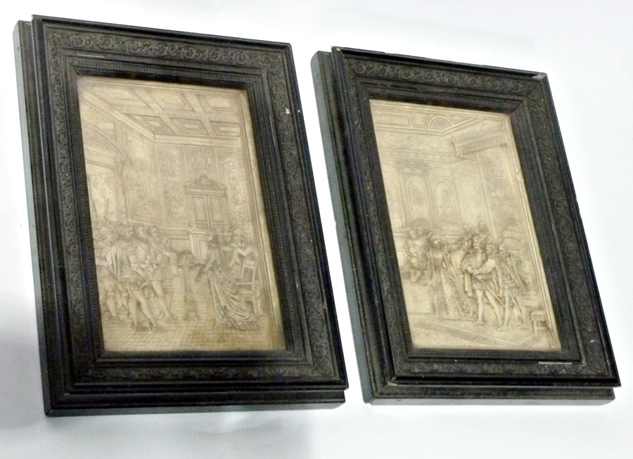 Pair composition relief plaques, Renaissance figures in interior scenes, in ebonised relief floral
