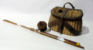 Leather-bound cane fishing creel together with fishing rod and reel