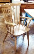 A set of six stickback kitchen chairs to include two carvers and four singles