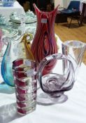 A Swedish Orrefors clear glass vase, a French clear and purple-cased cylindrical glass vase and