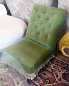 A Victorian mahogany nursing chair, green upholstery, buttonback,  upholstered seat with tassels, on