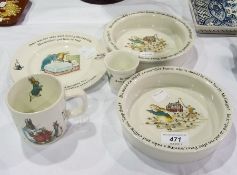 Wedgwood child's pottery Peter Rabbit table set viz:- plate, mug, eggcup and two dishes