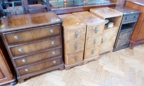 A modern mahogany chest of five drawers, on bracket feet, with hoop handles, 63cm wide, pair