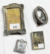 Early 20th century silver-mounted photograph frame, oval, another smaller, rectangular, another
