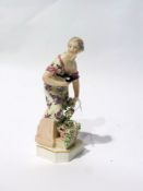 A Chelsea/Derby porcelain figure of lady holding dove, hand-painted, 18cm high, marked to base "From