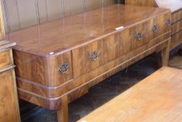 An early nineteeth century mahogany converted square piano with three frieze drawers, on square