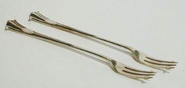 Pair of Victorian silver pickle forks, with scroll handles, Sheffield 1900
