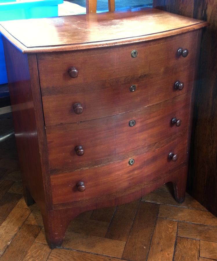 19th century mahogany bow-fronted commode having quadrant mould edge and lift-up top with front