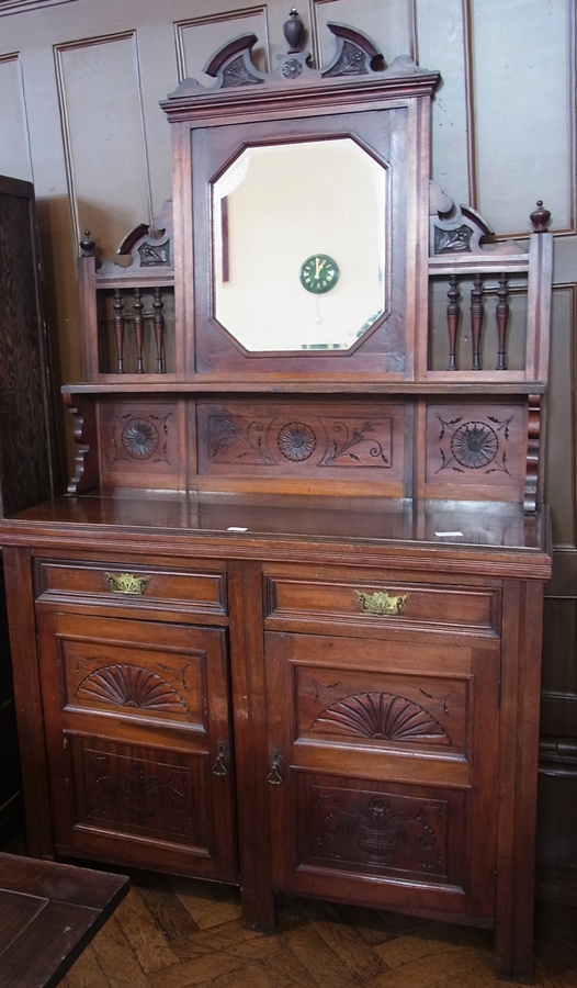 A late Victorian mahogany mirror back sideboard with shelf and two frieze drawers, a pair of