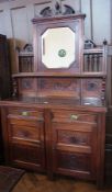 A late Victorian mahogany mirror back sideboard with shelf and two frieze drawers, a pair of