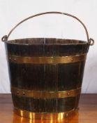 Antique brass bound oak bucket with copper swing handle, 40cm diameter
