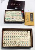 Mah Jong set in hardwood box and "The Game of Mah Jong" by Max Robinson, (12th edition) (2)