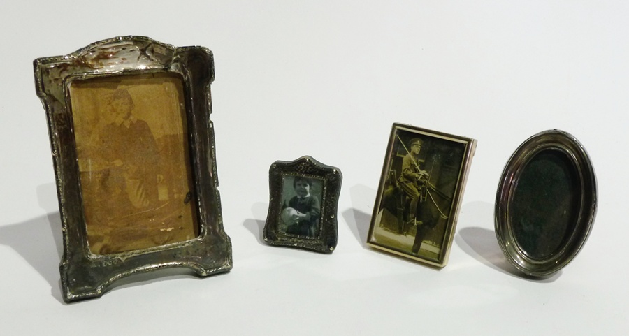 Early twentieth century silver mounted photograph frame, oval, another smaller shape rectangular,