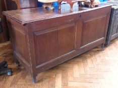 Large oak coffer  the double plank top with ogee mould edge, double frame panelled front and frame