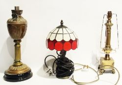 Victorian copper oil lamp on black glass plinth, Victorian-style brass electric table lamp and