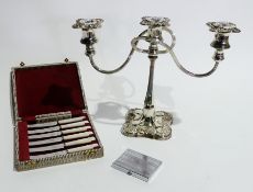 Silver plated candelabrum, three-light set with six mother-of-pearl handled tea knives and a white