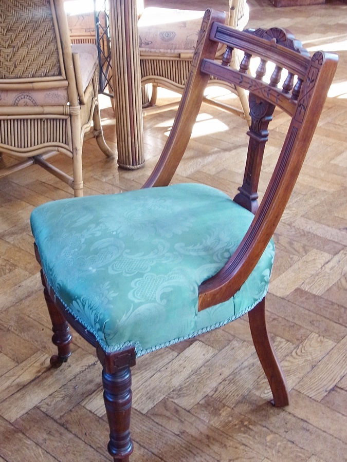 Set of six Victorian mahogany dining chairs with channelled top rail, fan carved central splat,