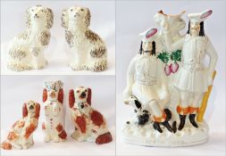 A collection of 19th century Staffordshire figures to include a pair of spaniels, two further