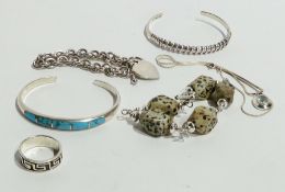 Two silver bangles, various silver bracelets, ring and a necklace