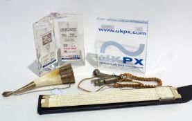 A quantity of items to include:- bosun's whistle, glass paperweights etc (1 box)