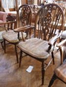 Pair reproduction hardwood Windsor wheelback open armchairs, turned supports and H-stretcher
