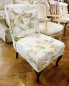Upholstered bedroom chair on cabriole supports