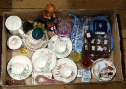 Assorted porcelain cups and saucers, glass paperweights, ceramic thimbles and other decorative items