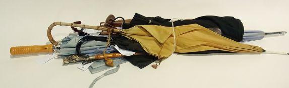 Quantity of umbrellas, various styles and materials