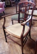 Edwardian inlaid mahogany open armchair, having curved and scroll toprail, pierced central splat all
