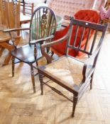 19th century hardwood rush seated open armchair, with channelled railback arms and ring turned