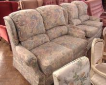 G-Plan suite comprising:- 2 two seater sofa's upholstered in cream, blue and lilac floral fabric