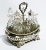 Georgian silver cut glass cruet in foliate loop handle, oval gadrooned body on shell tab feet and