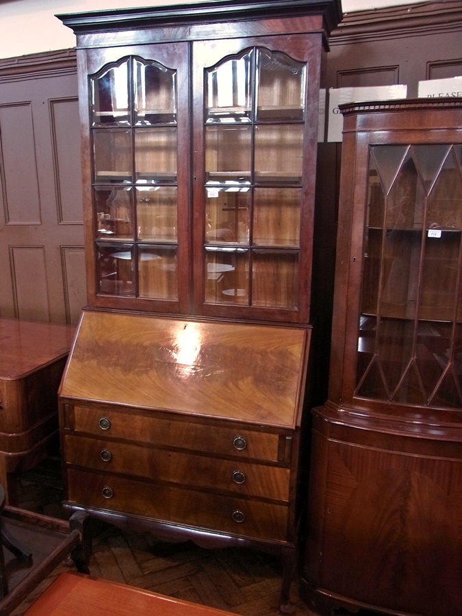 Twentieth century Chippendale style mahogany bureau bookcase, with straight moulded cornice, the