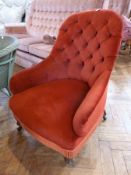 Victorian buttonback drawing room chair, with upholstered back and seat in red dralon, on turned