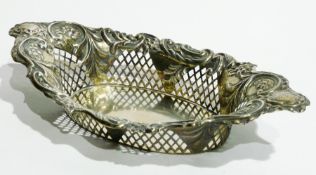 Victorian silver oval basket with floral and scroll repousse and open fretwork borders, Chester