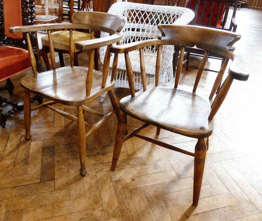 Hardwood smoker's bow open armchair, with shaped shoulderboard, ring turned spindles, similar turned