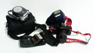 Small quantity of cameras, comprising:- Canon T50 still camera, cased and Canon 240T Speedlite