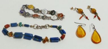 Pair amber drop earrings on gold studs, another pair on silver wire, lapis, amber, coral and