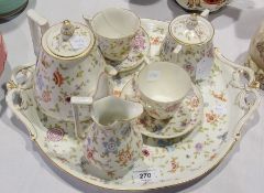 A Rudolstadt porcelain cabaret set with tray, teapot, milk jug, sugar bowl and two cups and