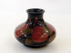 Moorcroft "pomegranate" vase, squat baluster-shape, 11.5cm high