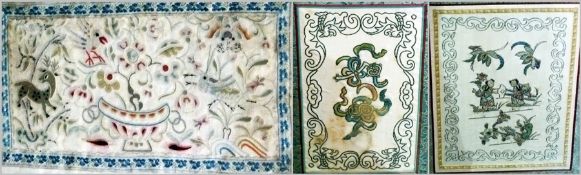 Three Chinese embroidered panels, probably Sanlan, figurative and foliate motifs, widths varying