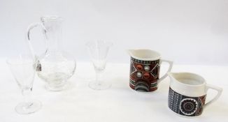 Dartington clear glass jug and two wine glasses, together with Portmeirion pottery "Variations" jugs