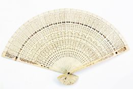 Chinese carved and pierced ivory brise folding fan, 20 cm sticks