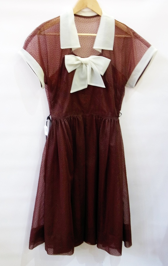 A Poplin vintage brown dress with white chiffon sleeves and collar with bow to bodice with a brown