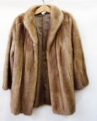 A three-quarter length vintage mink jacket